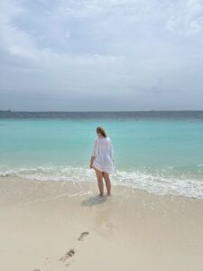 Personal Travel Planner on private beach in Maldives