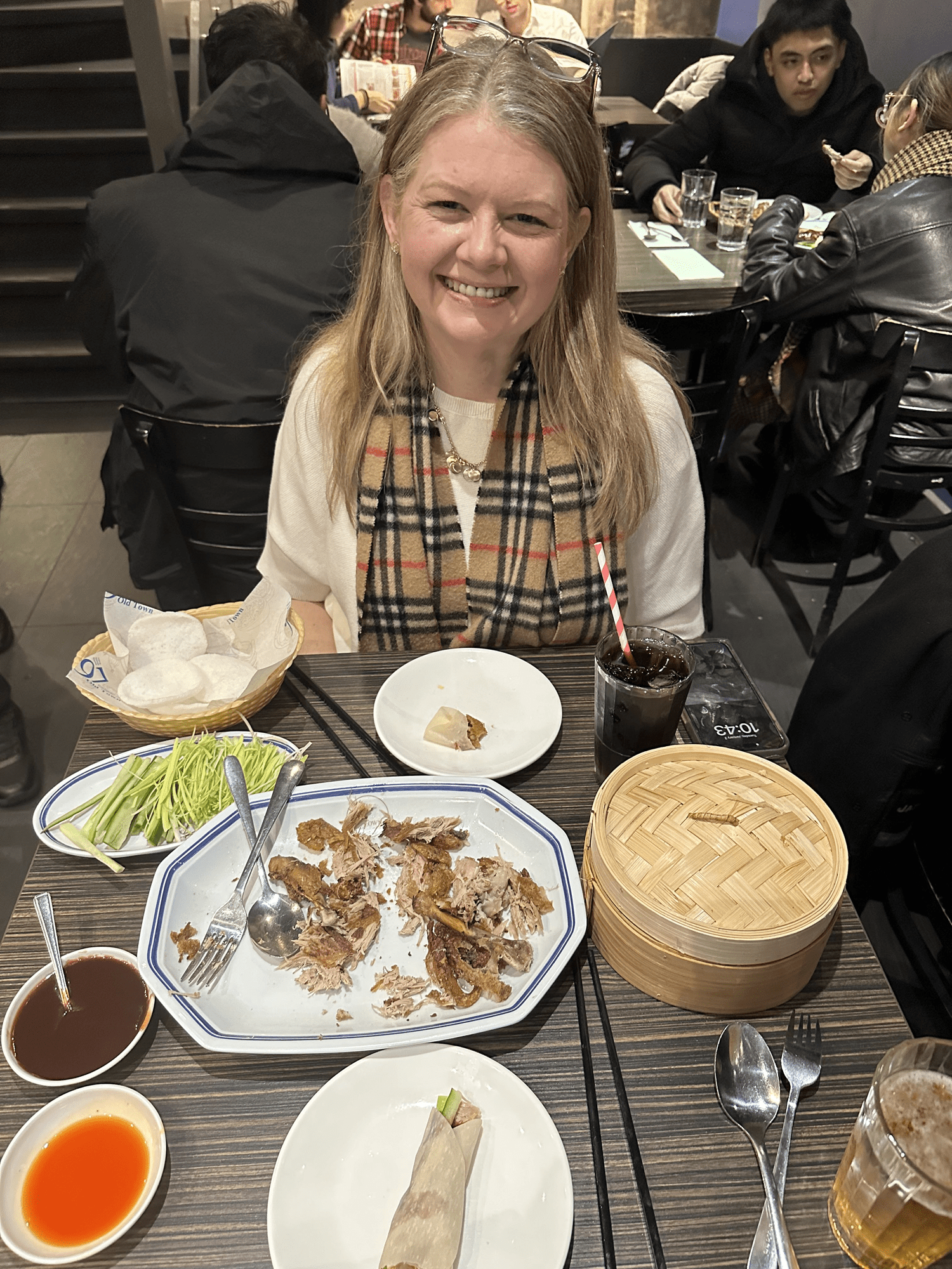 Personal Travel Planner Brandie enjoying crispy duck in London’s Chinatown, at a restaurant she didn’t have to pick out