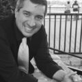 Closeup picture of satisfied traveler Jorge G, who loves the extra tips and information we include in our custom travel plans