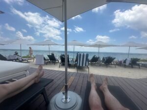 Personal Travel Planner at a beachside pool in cancun, mexico